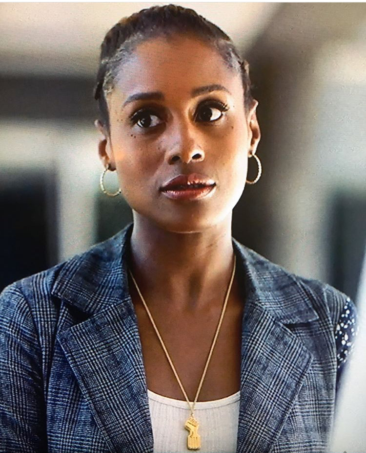 Gold black power fist pendant Clearance