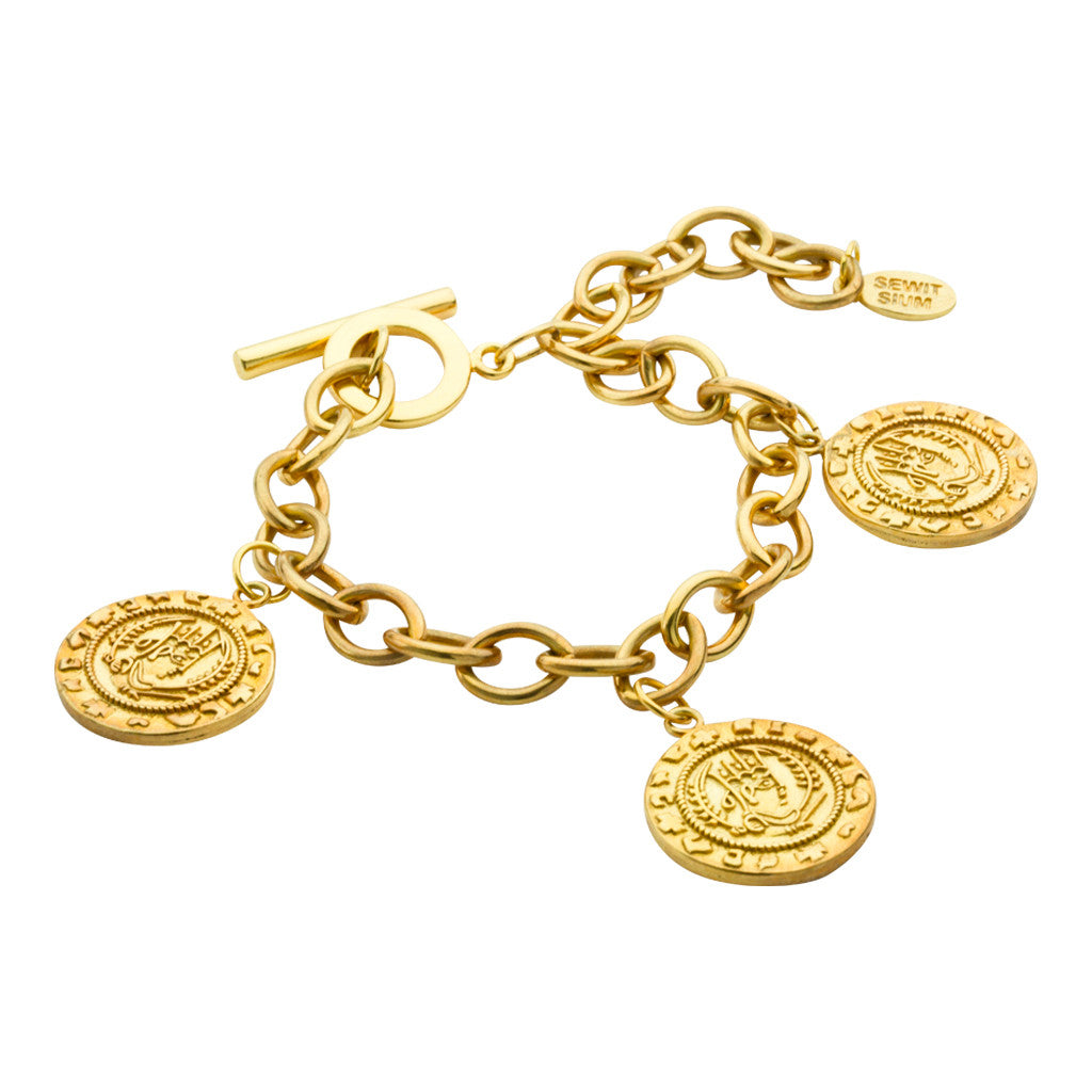 Axum charm bracelet, Classic coin charm bracelet inspired by ancient Axum civilisation in burnish gold. Finished with toggle closure